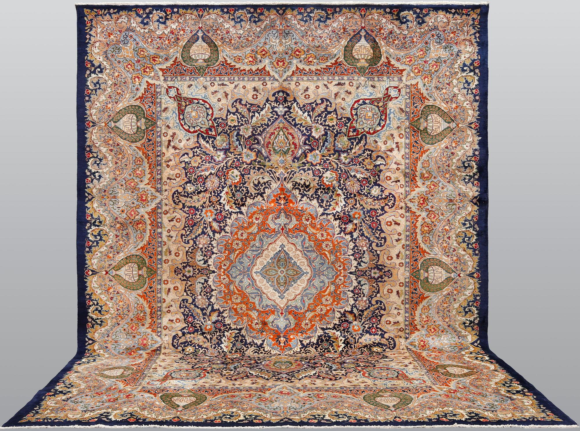 A figural Kashmar carpet, 391 x 306 cm.