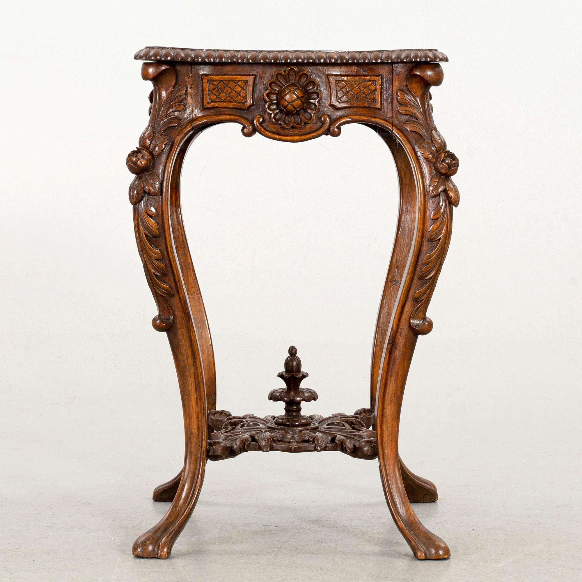 A NEO ROCOCO SMALL TABLE.