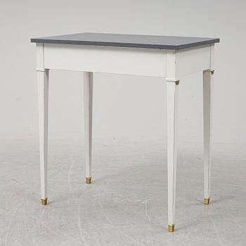 A Gustavian style table, first half of the 20th century.
