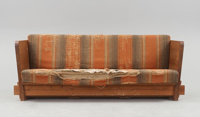 Axel Einar Hjorth, a 'Lovö' stained pine sofa, Nordiska Kompaniet, Sweden 1930's.