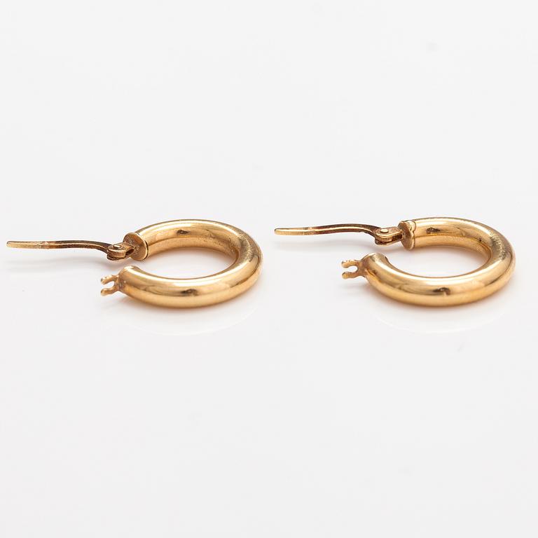 A pair of 14K gold earrings. Italy.