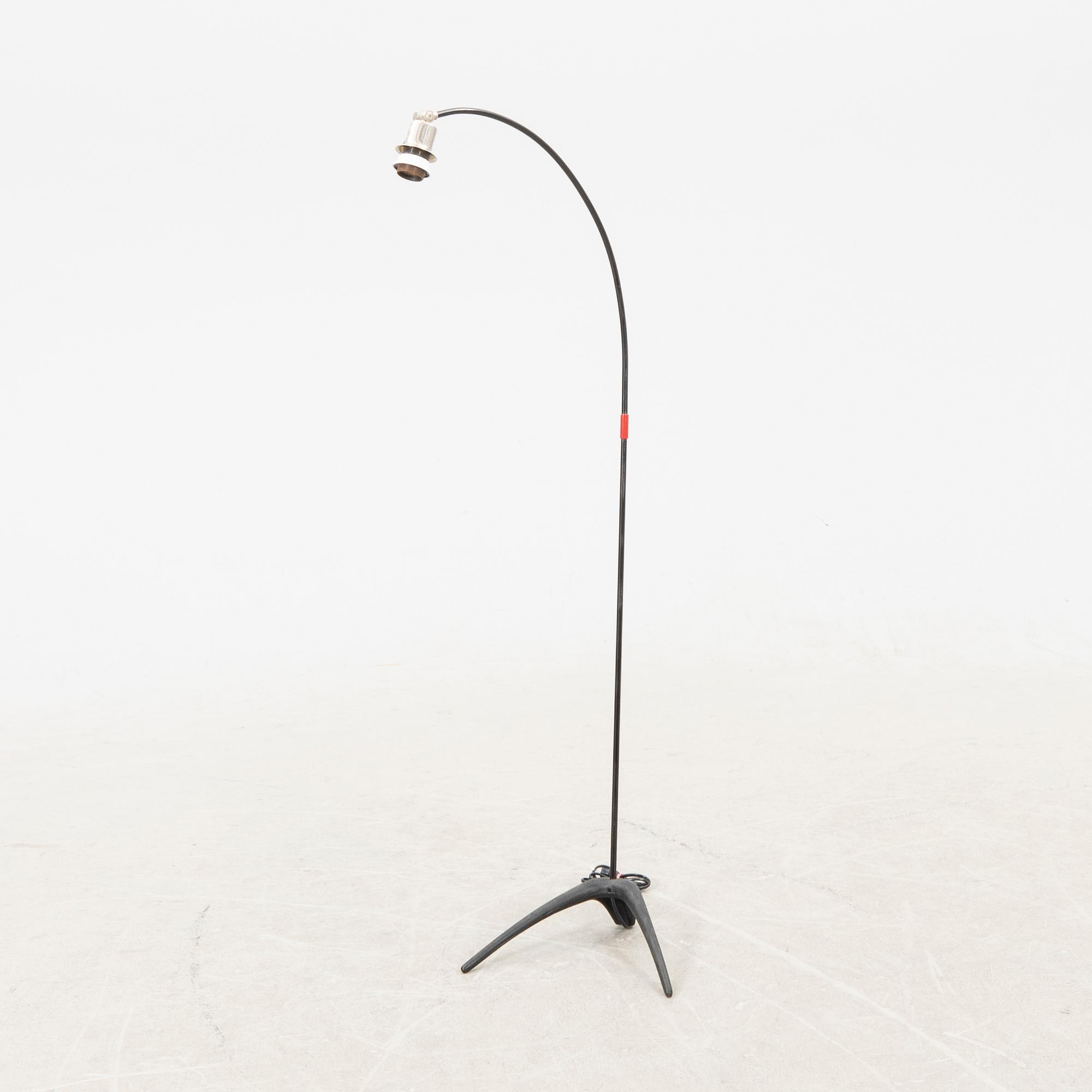 A metal floor lamp from the later part of the 20th century.