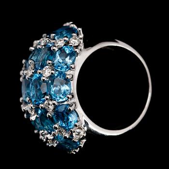 RING, 18 k vitguld, briljantslipade diamanter tot ca 0.80 ct samt 21 turkosa topaser.