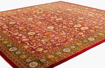 An antique Lahore carpet, northern India (todays Pakistan), approx. 463 x 404 cm.