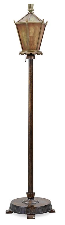 A 1930's floor lamp, the base of stained birch,
