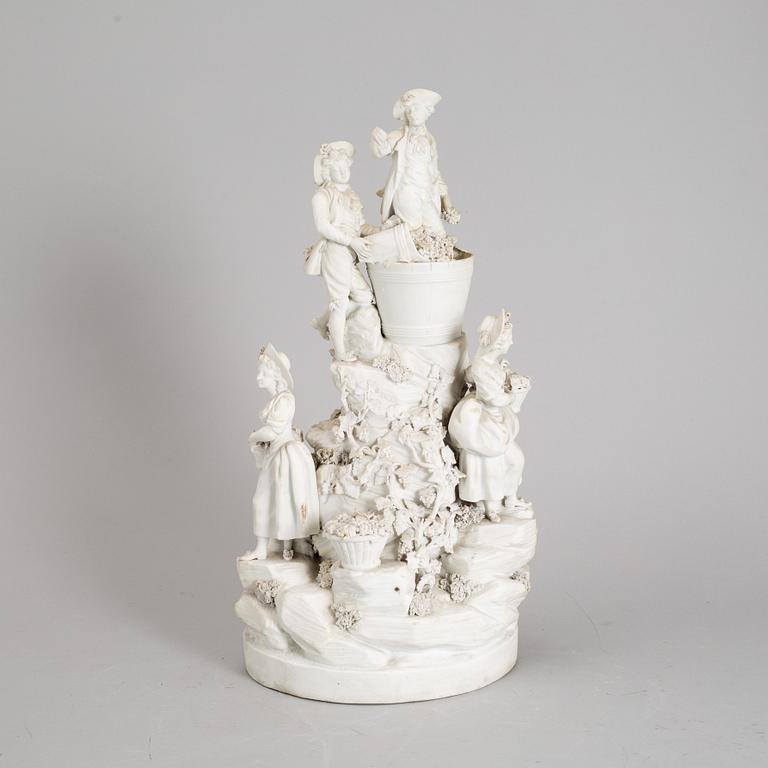 A biscuit porcelain figure group, circa 1900.