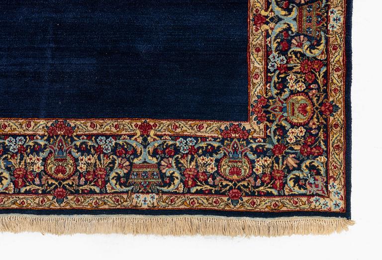 A semi-antique pictoral 'Lion and Sun' Kerman rug, c. 243 x 144 cm.