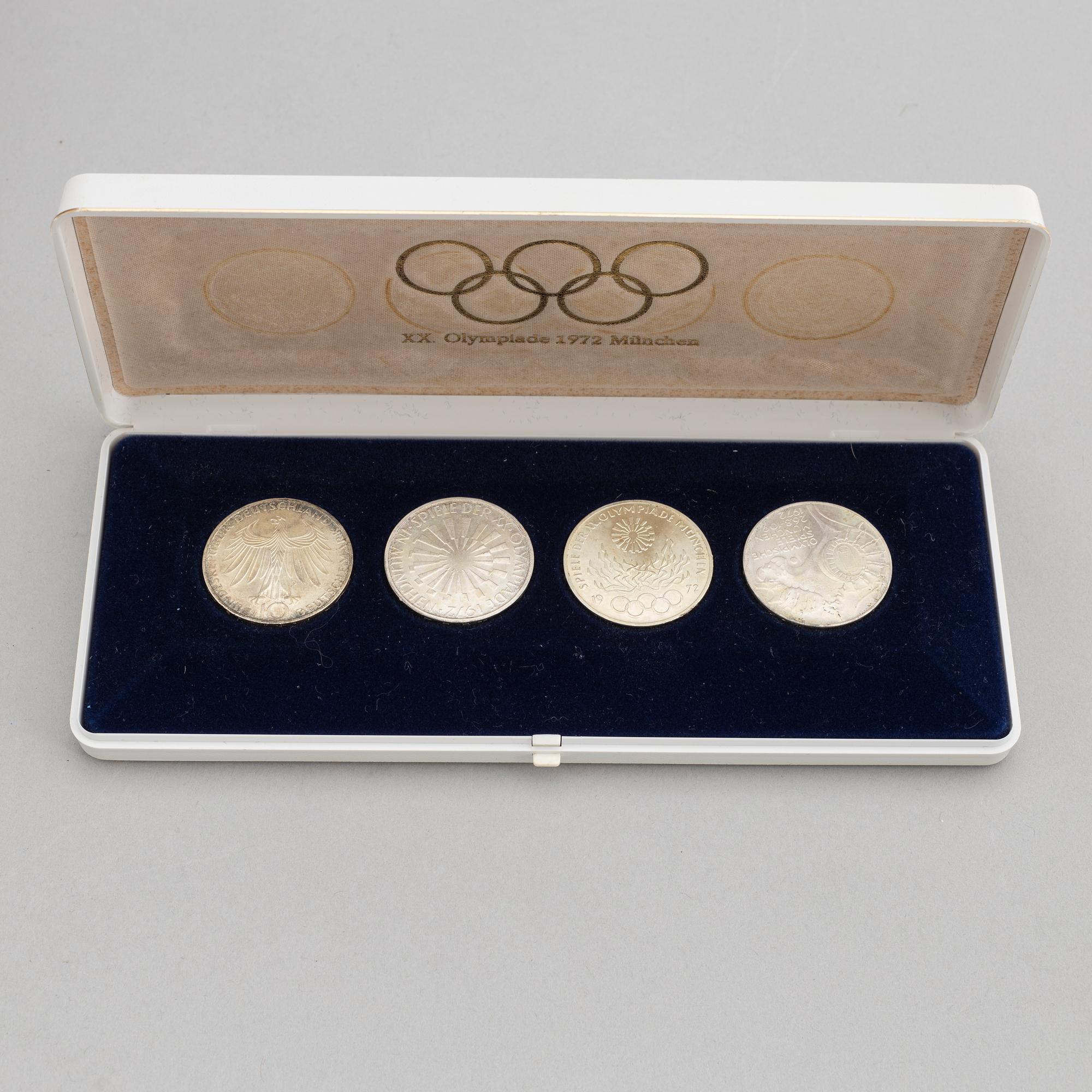 Olympic memorabilia: A teddy bear and four silvercoins from the 1972 games in Munich.