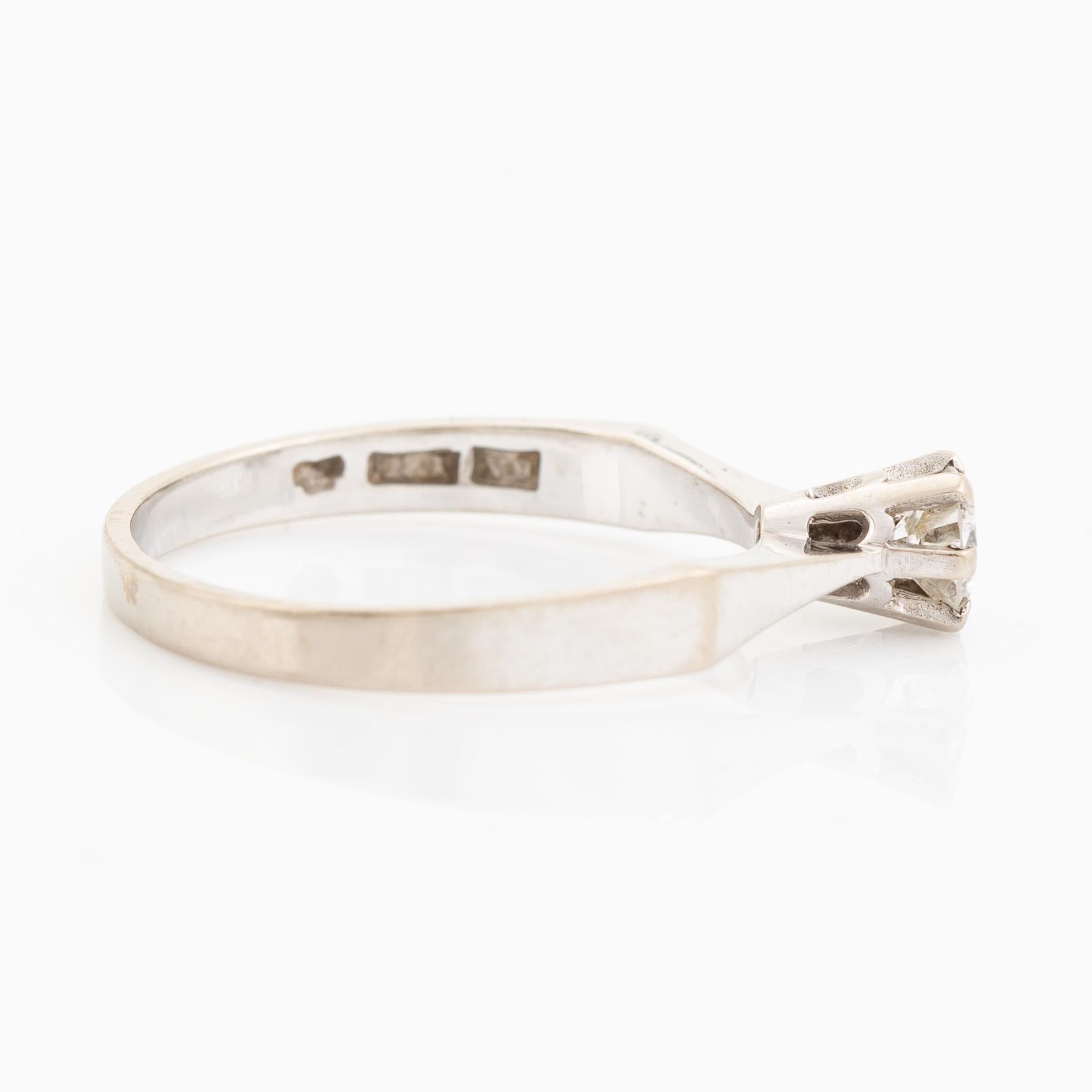 Brilliant cut diamond ring.