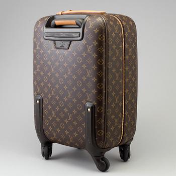 A Monogram Canvas "Zephyr" Suitcase by Louis Vuitton.
