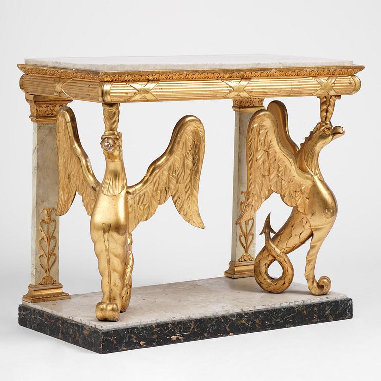 A Swedish Empire gilt wood and white marbel console table.