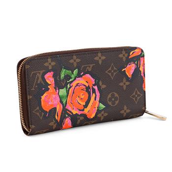 733. LOUIS VUITTON, a monogrammed canvas wallet, "Stephen Sprouse Roses Zippy", limited edition s/s 2009.