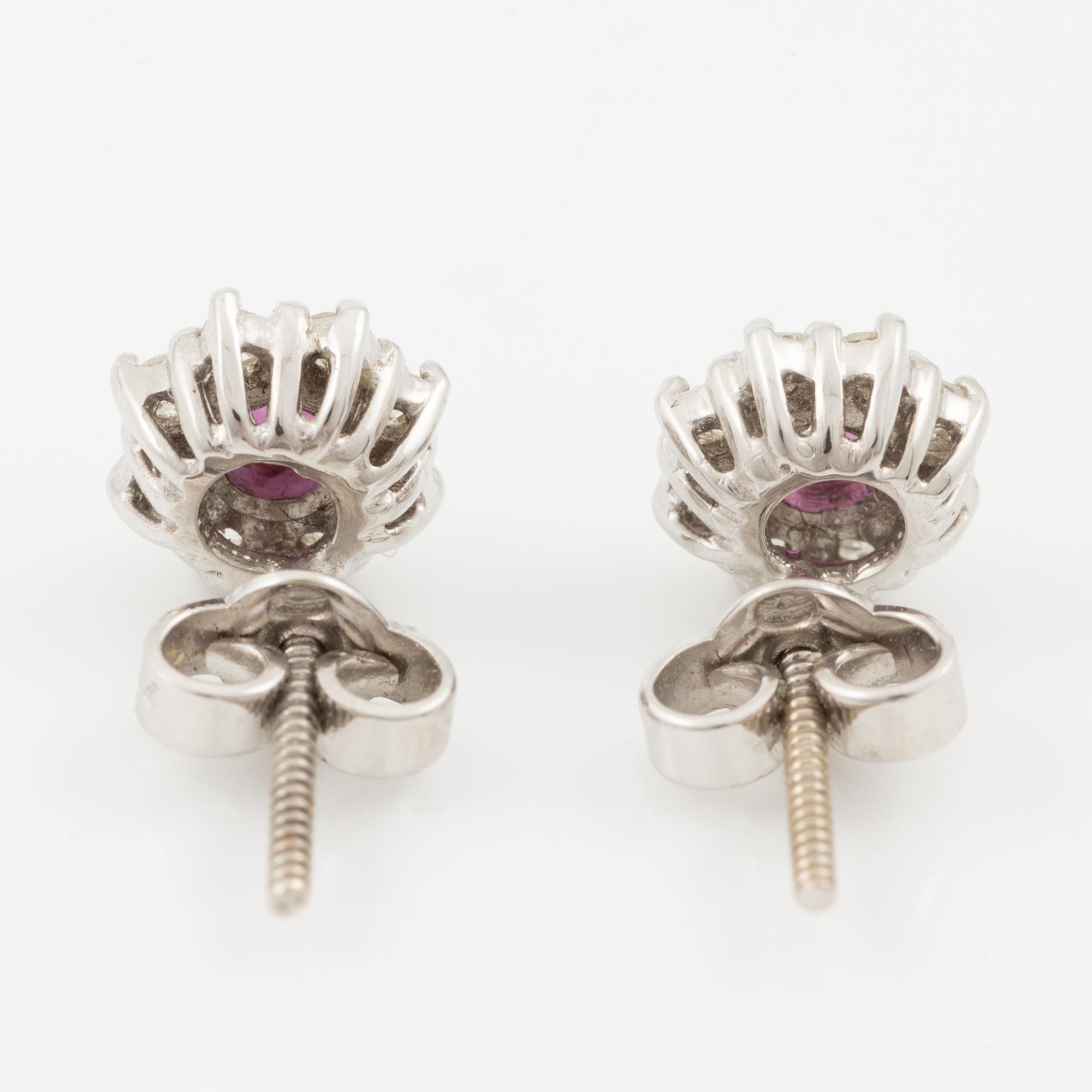 Pendant with gold chain, 
Pendant with white gold chain, 
Earrings a pair, rubies with brilliant-cut diamonds.