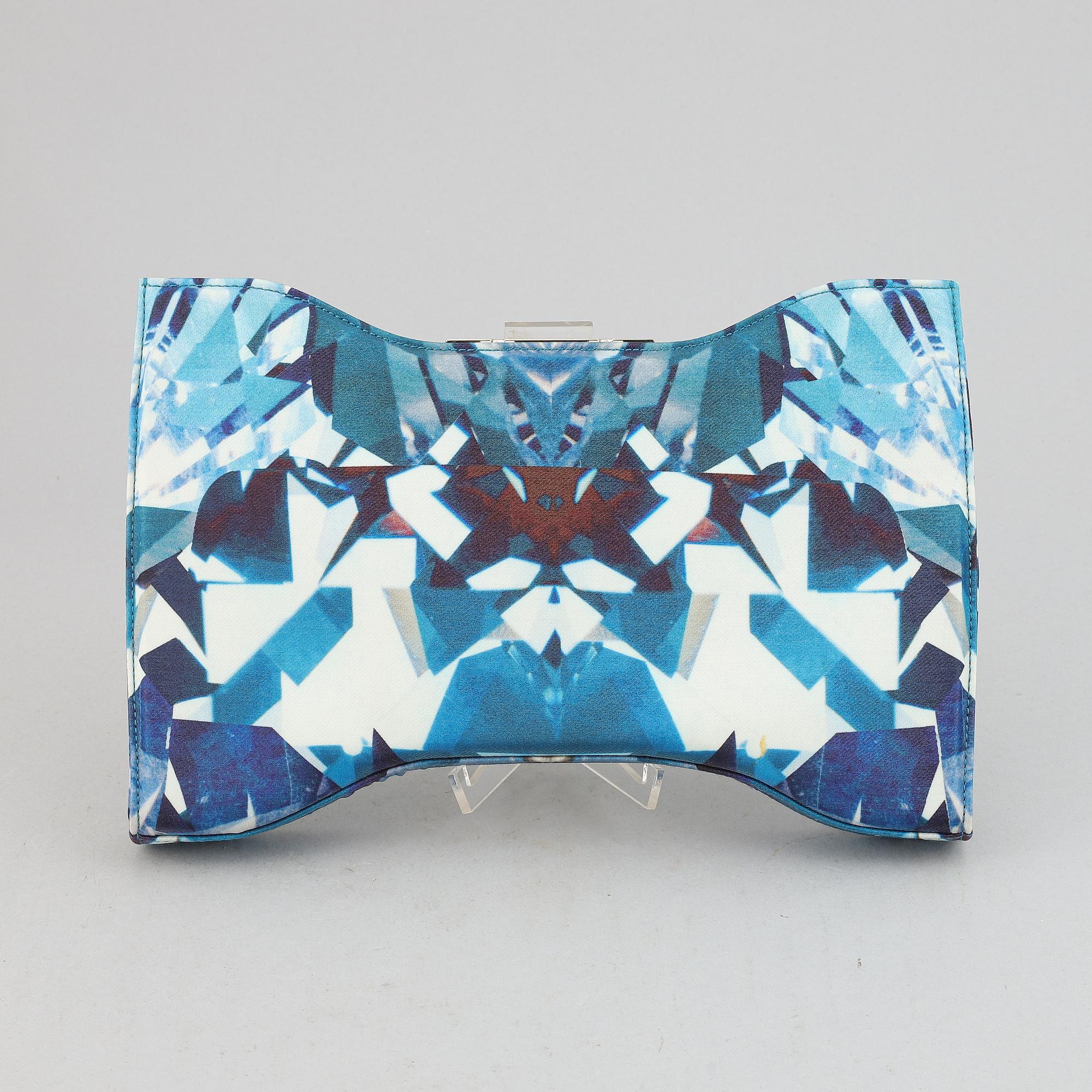 Alexander McQueen, a fabric clutch.