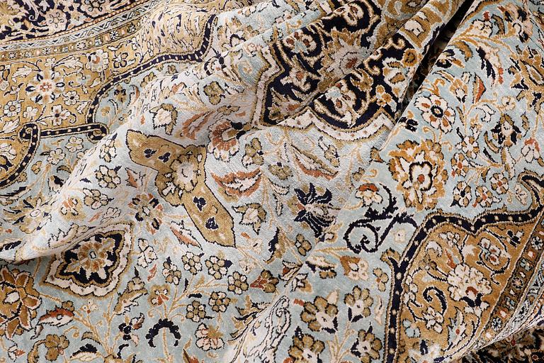 A carpet, silk Qum, ca 203 x 134 cm.