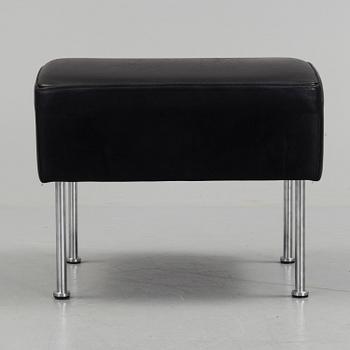 A "Cinema" footstool by Gunilla Allard.
