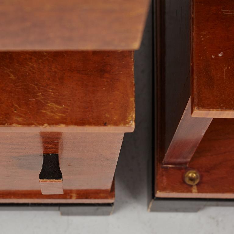 A pair of 1930's bedside tables.