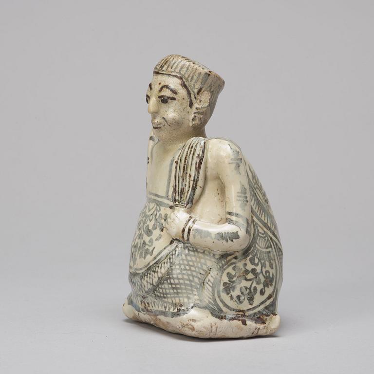 A Sawankhalok figurine/joss stick holder, 15th/16th Century.