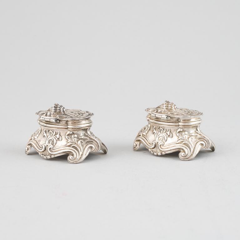 A pair of Louis XV-style silver salt cellars, Paris 19th century.