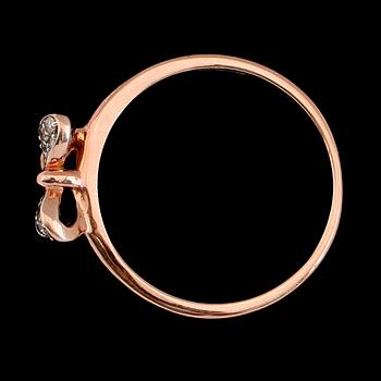 RING, 10K roséguld, åttkantslipade diamanter tot ca 0.10 ct. Vikt ca 2 g.
