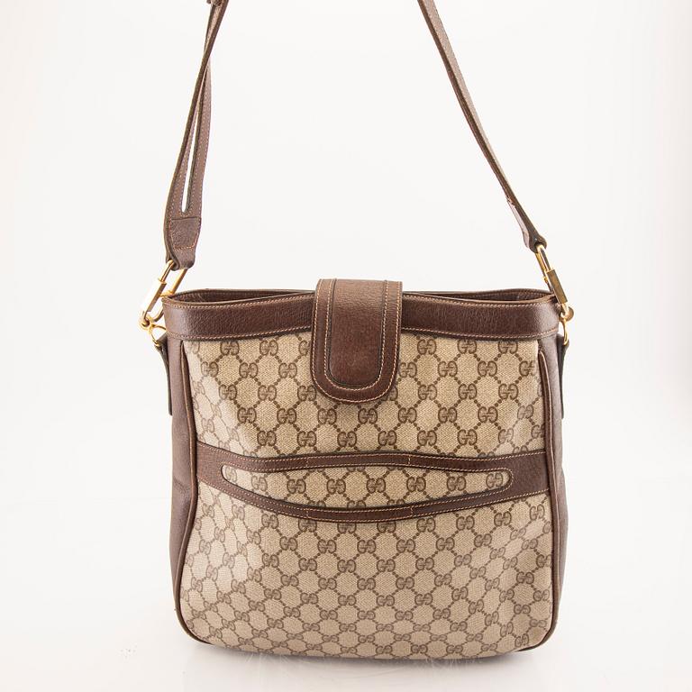 Gucci, a shoulder strap bag.