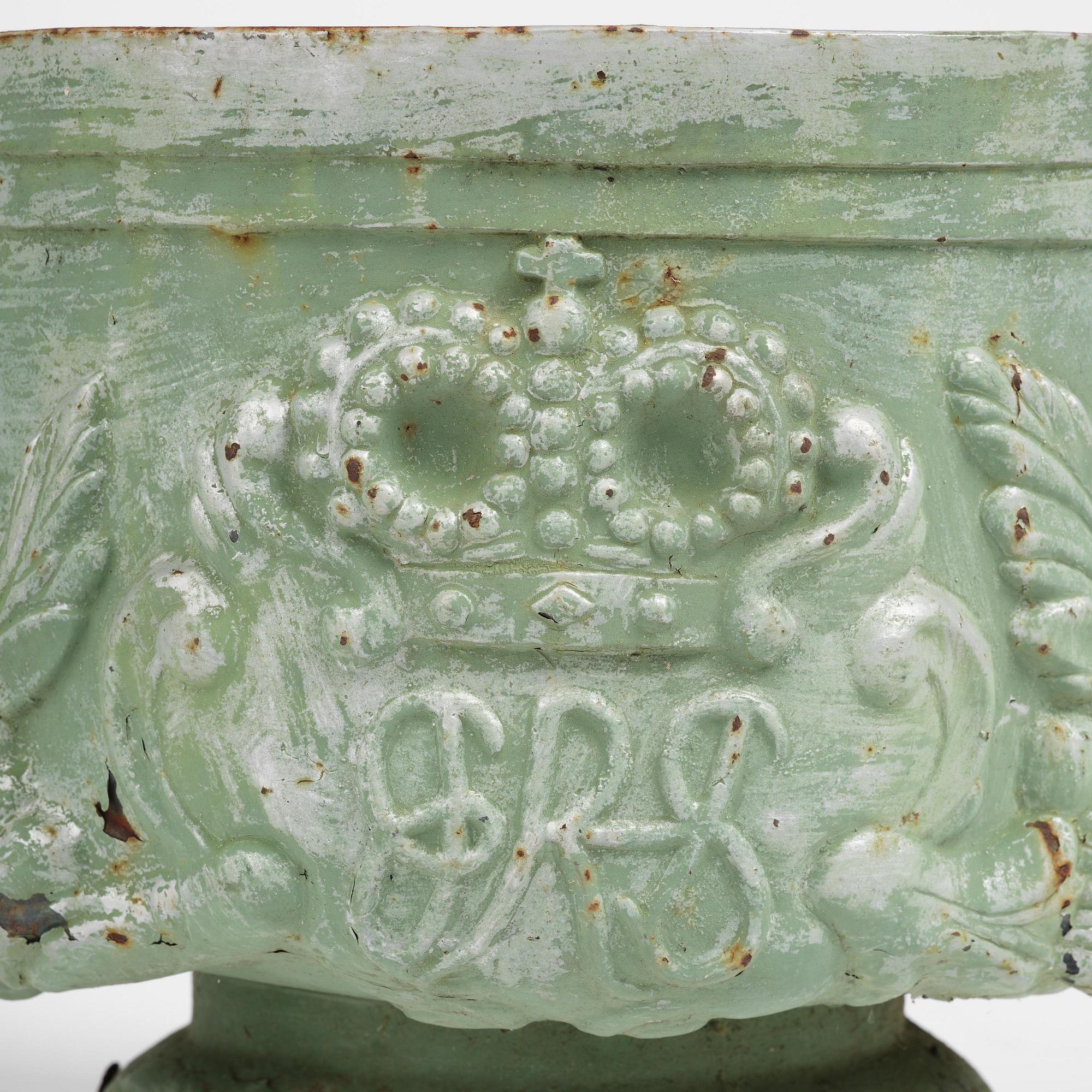A pair of Swedish cast-iron garden urns, presumably later part 19th century.