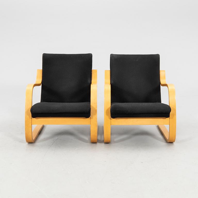 Alvar Aalto, a pair of armchairs model 402 Artek Finland second half of the 20th century.