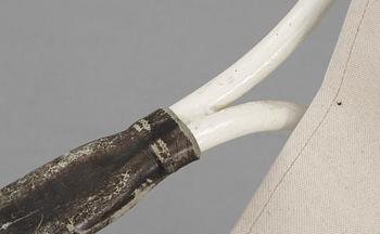 A Gustaf Isak Claesson lacquered metall and canvas easy chair, ca 1930.