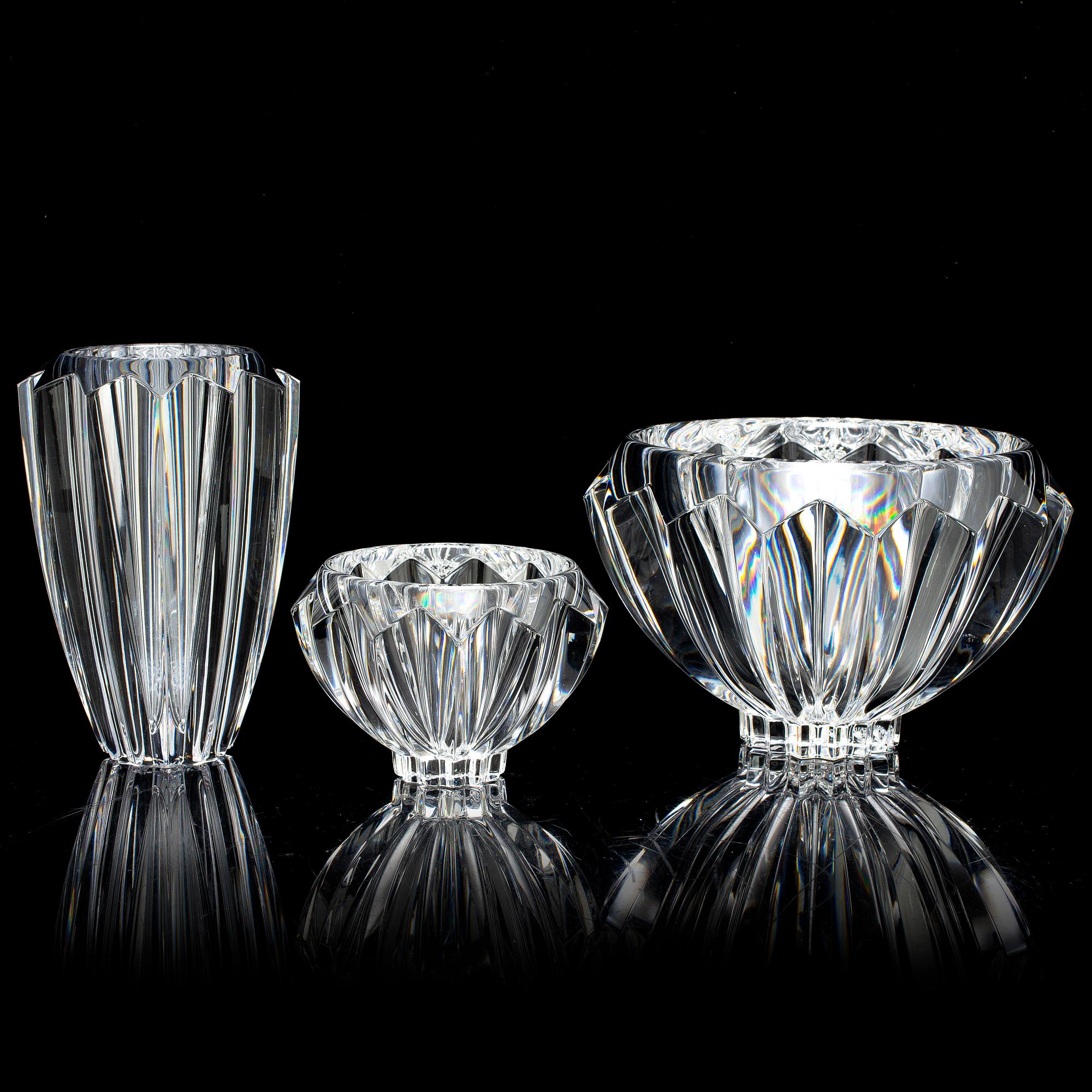 ERIKA LAGERBIELKE, a glass 'Zodiak' vase and two bowls from Orrefors.