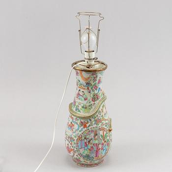 A famille rose Canton vase made in to  a lamp, Qing dynasty, 19th Century.