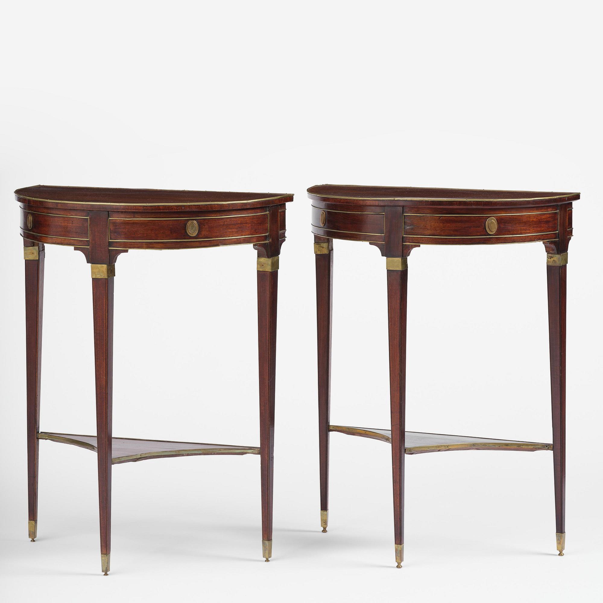 A pair of late Gustavian mahogany consoles in the manner of A. Lundelius, Stochkolm, late 18th century.