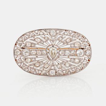 A BROOCH set with rose- and old-cut diamonds.