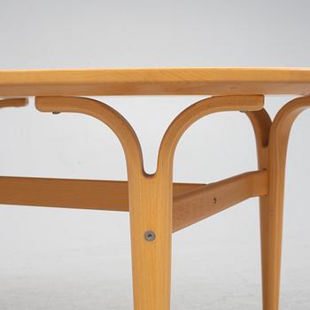 Bruno Mathsson, a birch coffee table, Mathsson International, Sweden, end of the 20th century.
