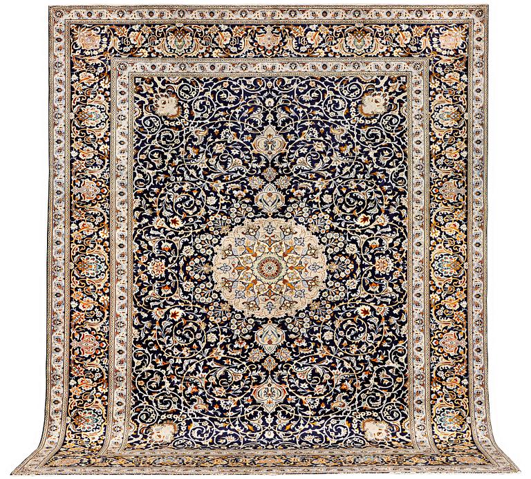 A Kashan carpet, c. 383 x 310 cm.