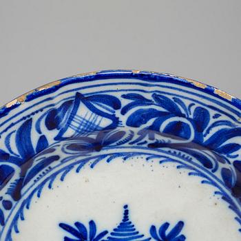 Three faiance dishes, 19th century.