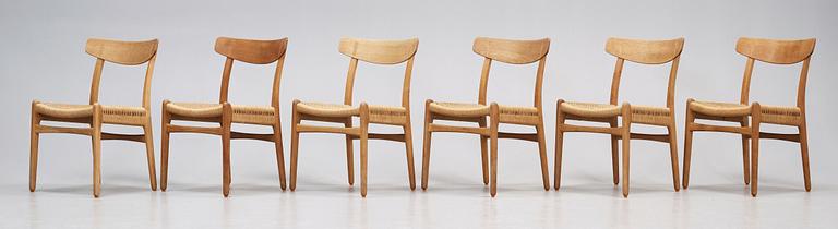 A set of six Hans J Wegner 'CH-23' oak dining chairs, Carl Hansen, Odense, Denmark.