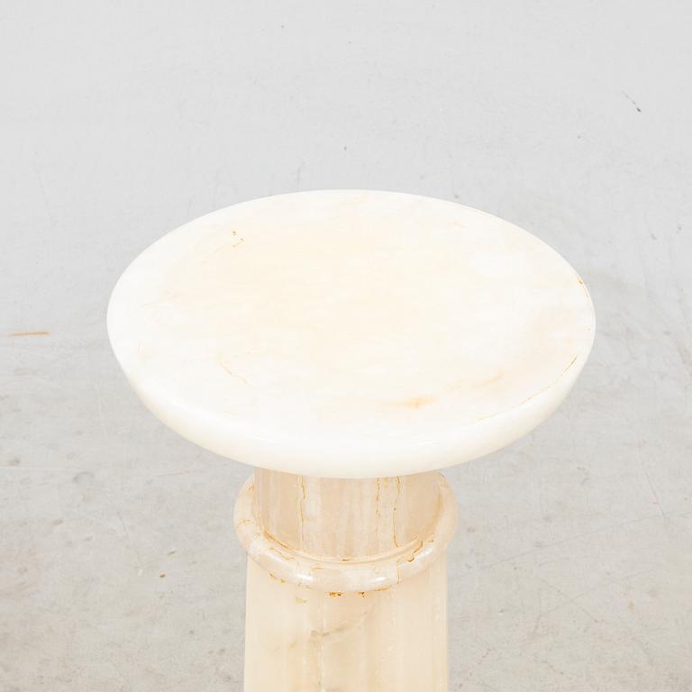 An alabaster pedestal later part of the 20th century.