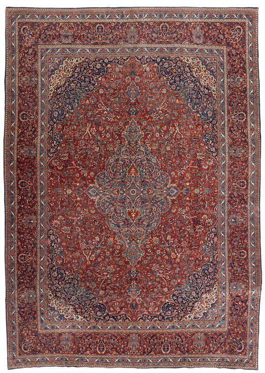 A carpet, semi-antique, Kashan, ca 443,5 x 314,5 cm.