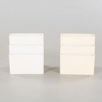 A pair of magazine racks, designed by Giotto Stoppino  for Kartell.