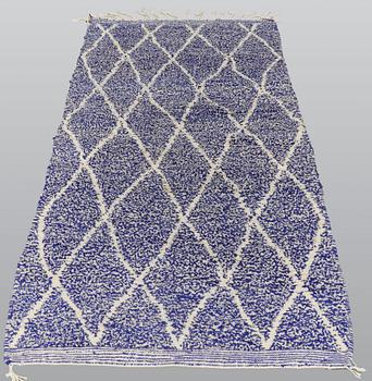 A carpet, Morocco, ca 240 x 104 cm.