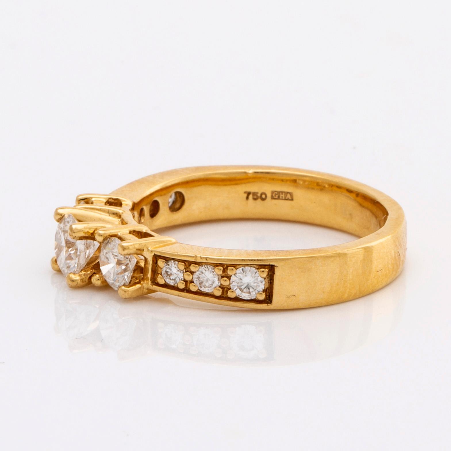 RING 18K gold w brilliant-cut diamonds. 3 center stones approx 0,70 ct in total.
