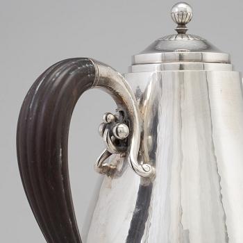 A three piece sterling silver coffee service "Cosmos" design Johan Rohde for Georg Jensen, Copenhage.