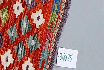 A runner kilim, ca 291 x 84 cm.