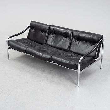 A blad leather upholstered 'Kadia' sofa by Tim Bates for Pieff, 1960's.