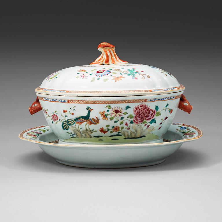 A large famille rose 'double peacock' tureen with cover and stand, Qing dynasty, Qianlong (1736-95).