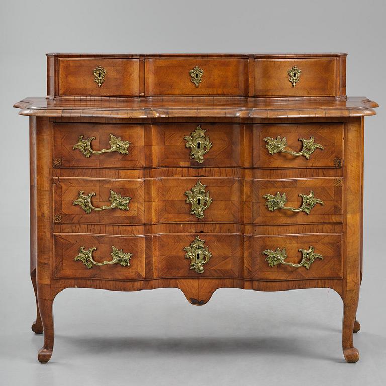 A late baroque walnut parquetry commode by C. Linning (master in Stockholm 1744-79).