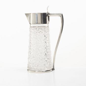 A glass and silver wine jug, CG Hallberg, Stockholm, 1901.