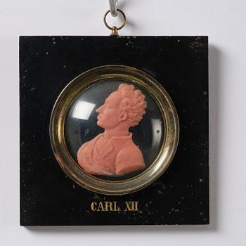 A set of twenty wax portraits of Swedish monarchs, late 19th century.