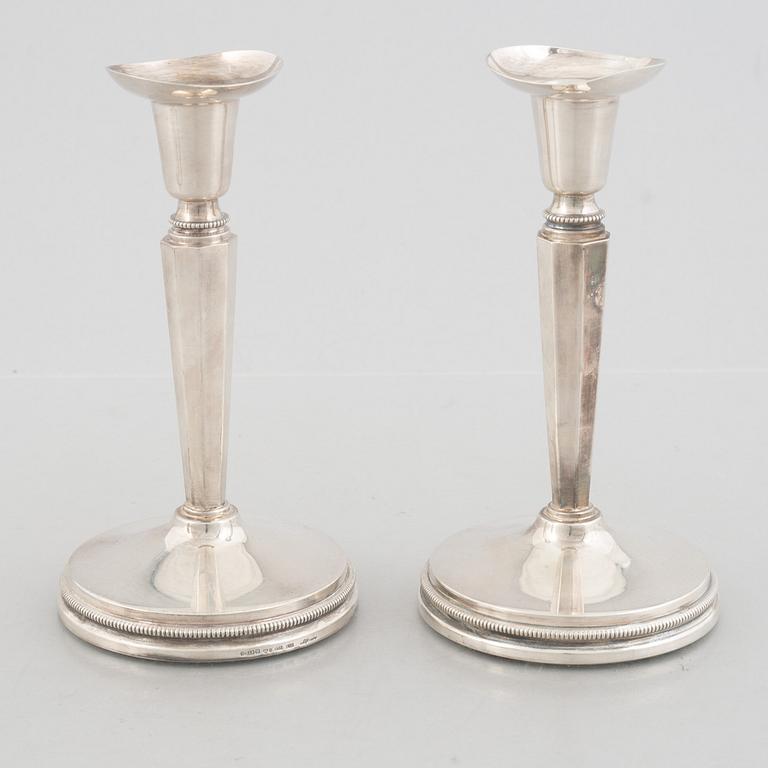 Two pairs of Swedish silver candlesticks, including Eric Löfman, MGAB, Uppsala 1979-1982.