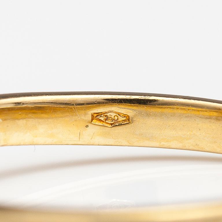 An 18K gold ring with a ca. 0.41 ct brilliant cut diamond.